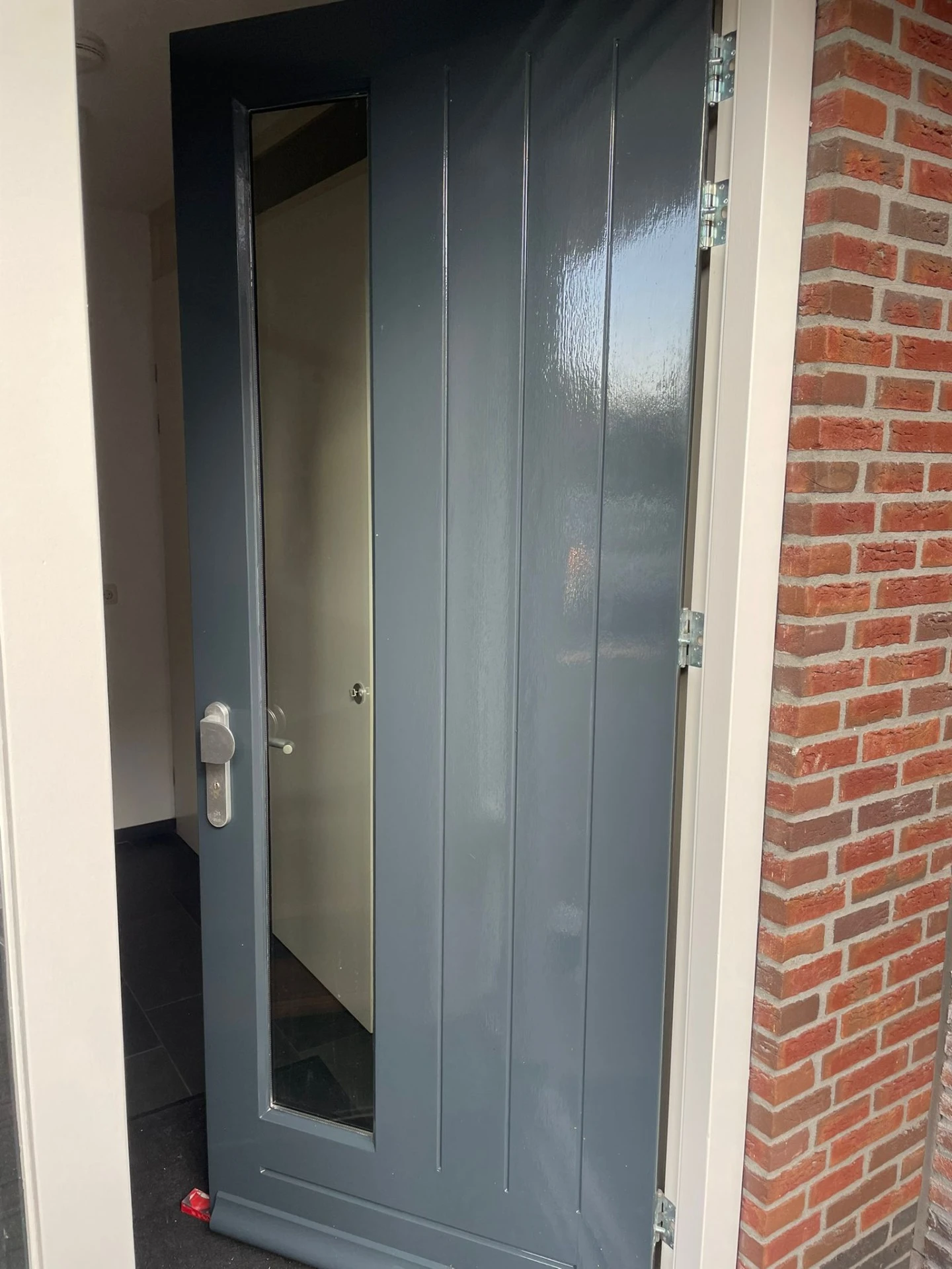 Geschilderde voordeur na oplevering